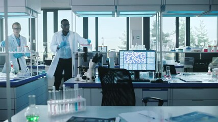Moving Dolly Time-Lapse: Medical Laboratory with Diverse Team of Professional Scientists Talking, Working with Microscopes, Computers. Developing Drugs, Gene Editing, High-Tech Biotechnology Research - Powered by Adobe
