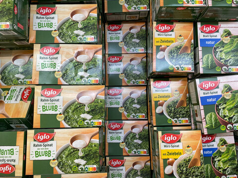 Viersen, Germany - July 9. 2020: Closeup of isolated boxs frozen Iglo ready spinach in cooling counter