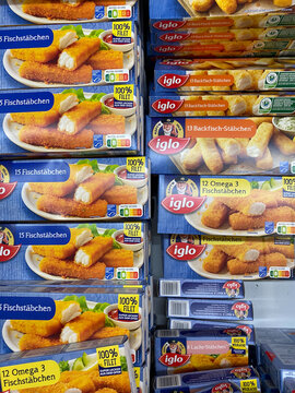 Viersen, Germany - July 9. 2020: Closeup of isolated boxes with captain iglo frozen fish sticks in cooling counter