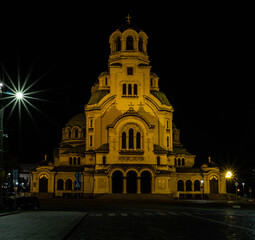 Fototapeta na wymiar A photo of the bulgarian orthodox cathedral in the center of Sofia at nighttime.