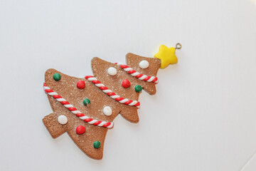 Christmas composition. Christmas gift, pine tree on white background