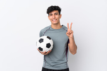 Argentinian football player man over isolated white background smiling and showing victory sign