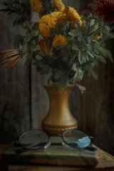 still life with book and flowers