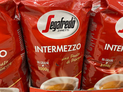 Viersen, Germany - July 9. 2020: View on isolated Segafredo intermezzo coffee packet in shelf of german supermarket (focus on center)