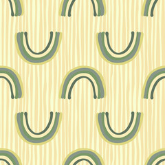 Pastel green rainbow silhouettes seamless doodle pattern. Simple print in scandinavian style with beige striped background.