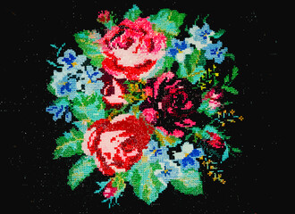 
Embroidered flowers on a black background