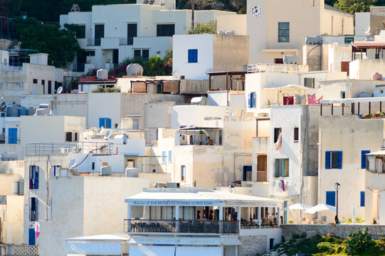 Island of Levanzo, Sicily, Italy, july 2020. This little sea town in the Egadi islanIsland of Levanzo, Sicily, Italy, july 2020. This little sea tos is wonderful with its white houses and blue windows