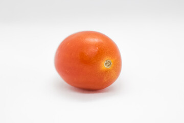 red fresh cherry tomato close up