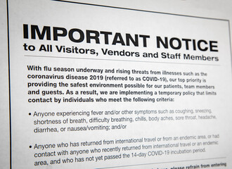 A sign at an office advising of Covid-19 procedures during the Coronavirus Pandemic