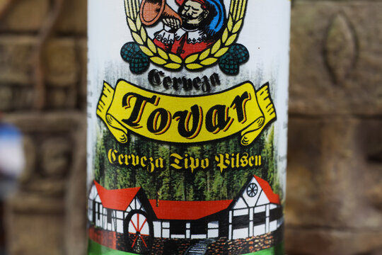 Viersen, Germany - July 9. 2020: Closeup of beer bottle label from german brewery in colonia tovar, Venezuela. (focus on bottle label)