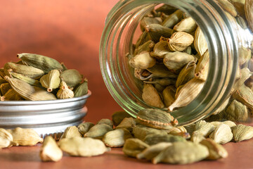 Green Cardamom Spilled from a Spice Jar