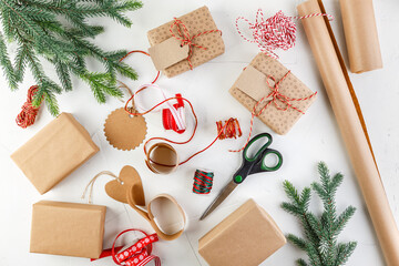 Christmas giftbox and presents wrapping in craft paper and decor