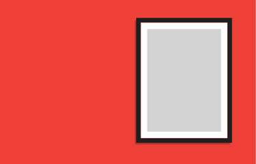 Blank Picture Frame with Room for Copy on a Bright Red Wall