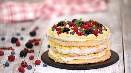 Summer berry layered cake with mint. Sweet food