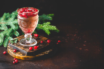 Festive Cranberry and rosemary cocktail with ice. Alcoholic or non-alcoholic cocktail