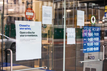 Covid closed sign Ney York City during Coronavirus quarantine at the door