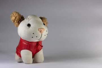 Stuffed dog toy in white background