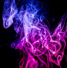 Colored smoke on black background