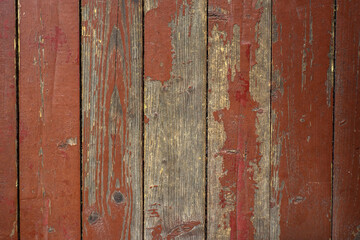 Wooden floor in the house with old red paint, texture