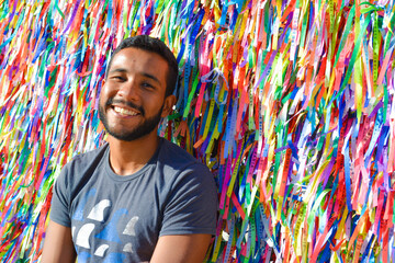 Happy Young  Aldut Smiling  at Salvador Brazil during summer Streamers wall