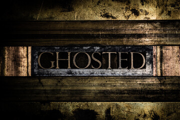 Ghosted text message on vintage textured grunge copper and gold background