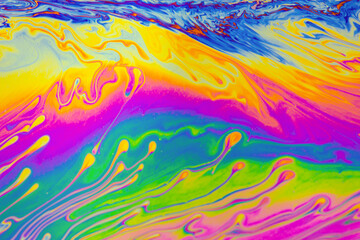 Psychedelic multicolored patterns background. Photo macro shot of soap bubbles