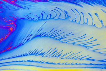 Psychedelic multicolored patterns background. Photo macro shot of soap bubbles