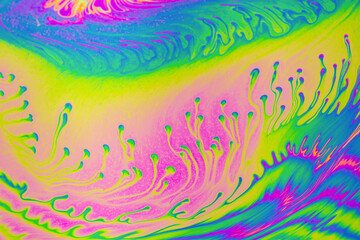 Psychedelic multicolored patterns background. Photo macro shot of soap bubbles