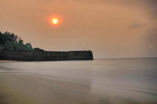 Beautiful Sinquerim Beach of Goa along with lower fort of aguada during sunset time