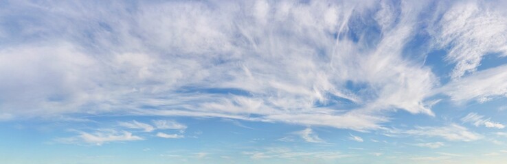 Bright sky background with cirrus clouds above, high resolution image