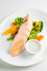 Fillet of salmon with cooked vegetables