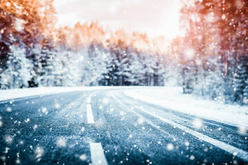 Winter road with snow and the trees all around