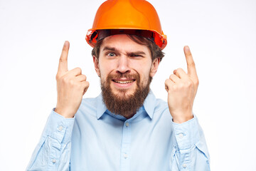 emotional man in work uniform gesturing with his hands an official construction professional