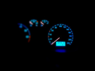 speedometer on black background