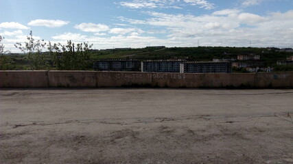 embankment of the city with a view of the abandoned village horizon time of year summer