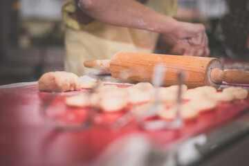 christmas background concept - kitchen tools for sweets preparation and child