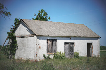 Abandoned building. An old farm in Chernobyl. Technological disaster