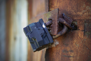 Old rusty door with a lock. Abandoned grunge building. Apocalypse in the photo Chernobyl
