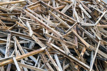Stack of bee hive frames in the back yard.