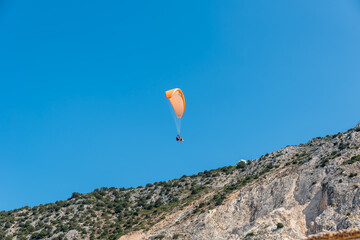 Fototapeta na wymiar Paragliding on the island of Kefalonia in Greece