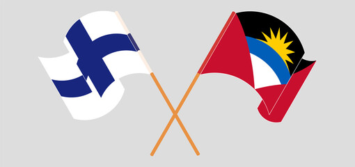 Crossed flags of Antigua and Barbuda and Finland