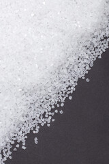 white crystals sea salt on darck background