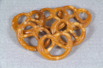 Bretzel biscuits for appetizer on gray background