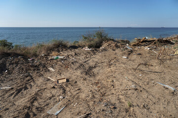 Garbage filled up on the seashore. Traces of human activity. pollution of the shores of India and Srilanka.