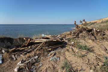 Garbage filled up on the seashore. Traces of human activity. pollution of the shores of India and Srilanka.