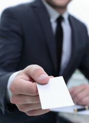 businessman offers you his business card