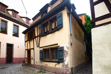 Fototapeta na wymiar Old architecture on half-timbered home on street in Strasbourg France