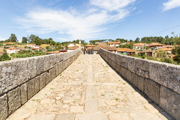 medieval bridge over Varosa river in Ucanha village, municipality of Tarouca, district of Viseu, Portugal