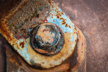 Colorful rusted metal screw