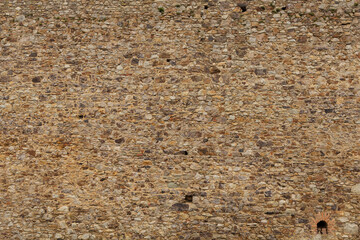 Large size medieval brown stone wall texture